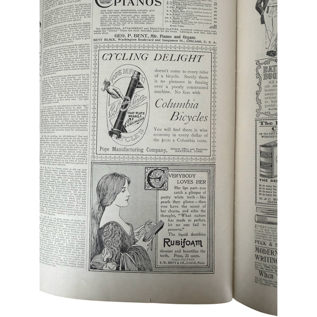 'Cycling Delight' ad for Columbia Bicycles and a lower advertisement for Rubifoam in the 1895 Ladies Home Journal 