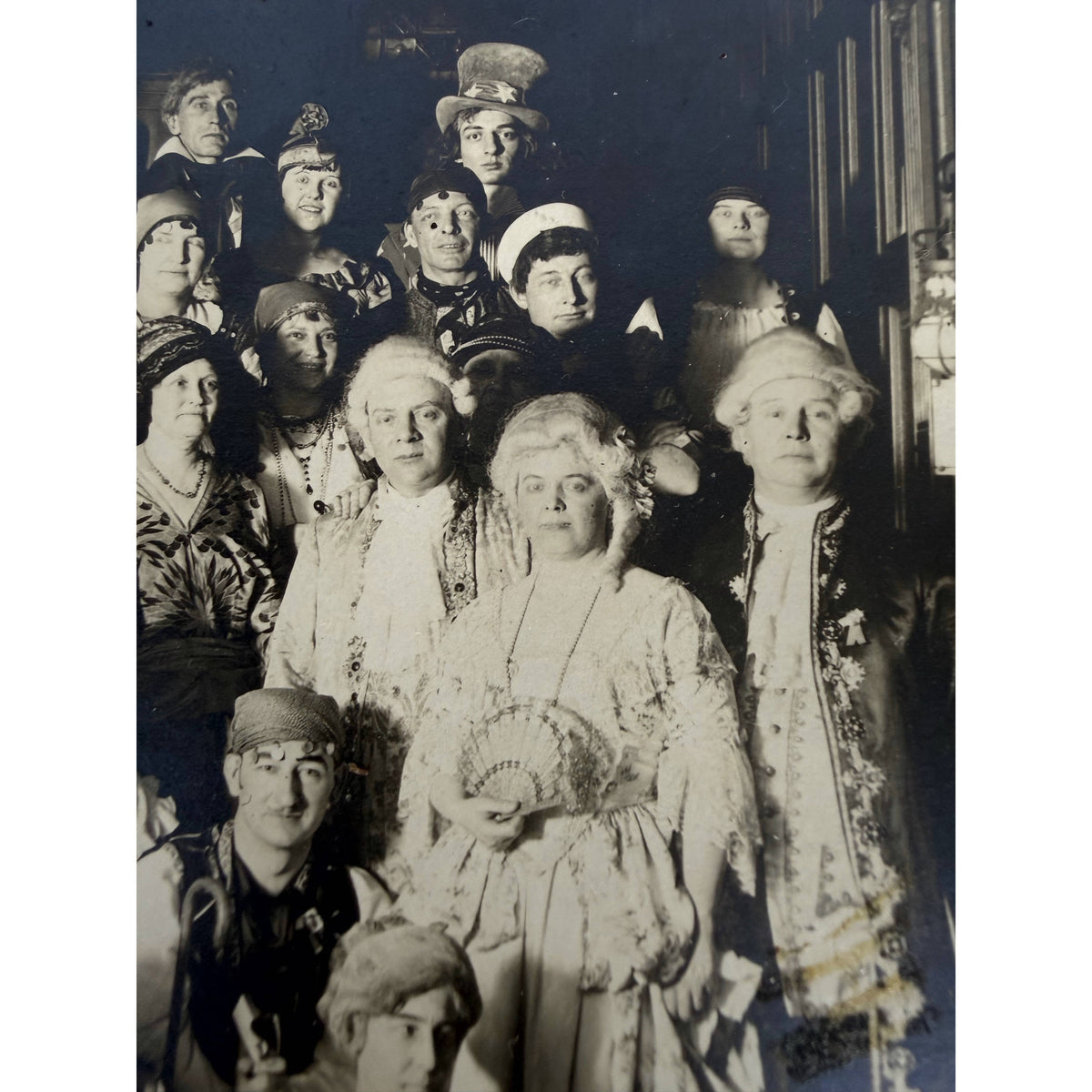 Detail of guests in elaborate costumes at 1927 Bailey Estate Halloween party