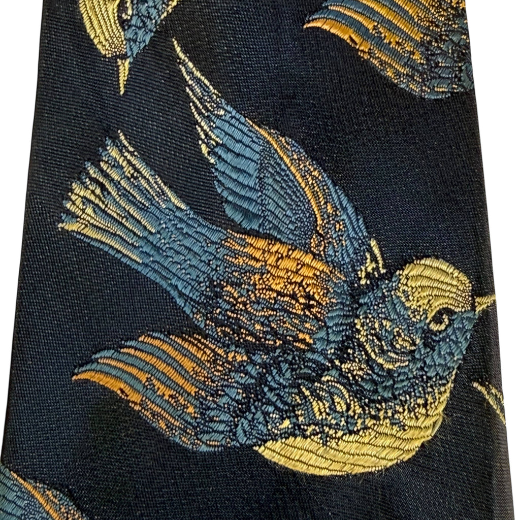 Detail of woven blue and gold bird jacquard design