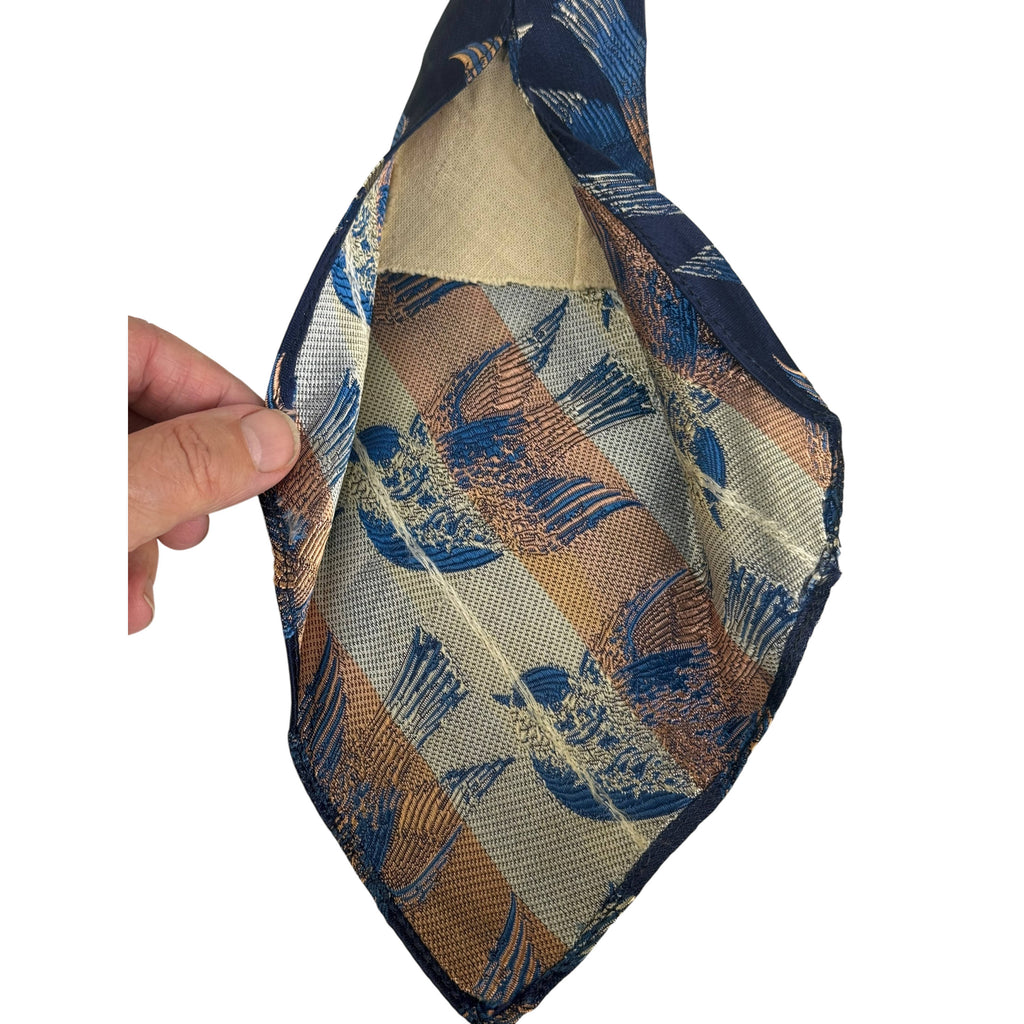 Reverse side of 1930s woven rayon jacquard bird tie