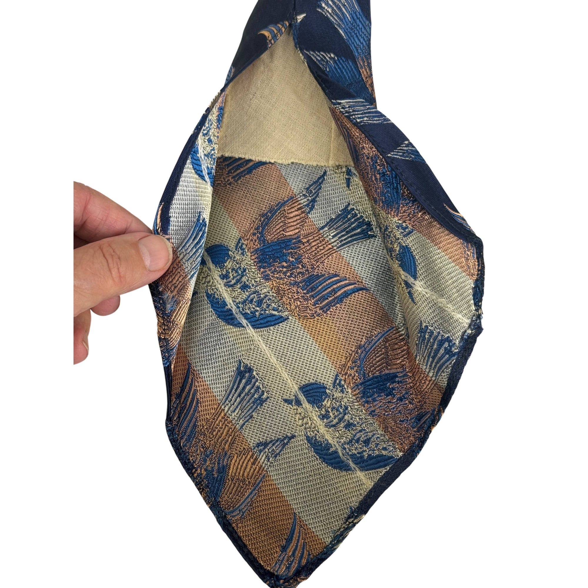 Reverse side of 1930s woven rayon jacquard bird tie