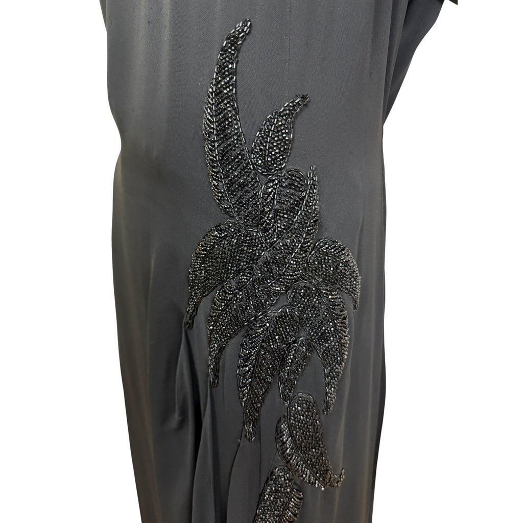 close up on beading on side of 40s dress