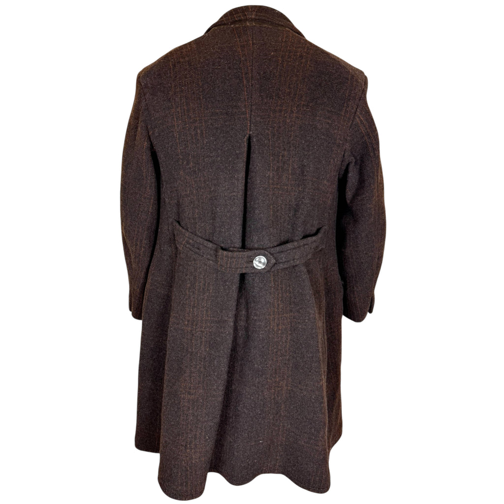 Back view of vintage 1930s wool overcoat showing buttoned half-belt and deep inverted centre pleat