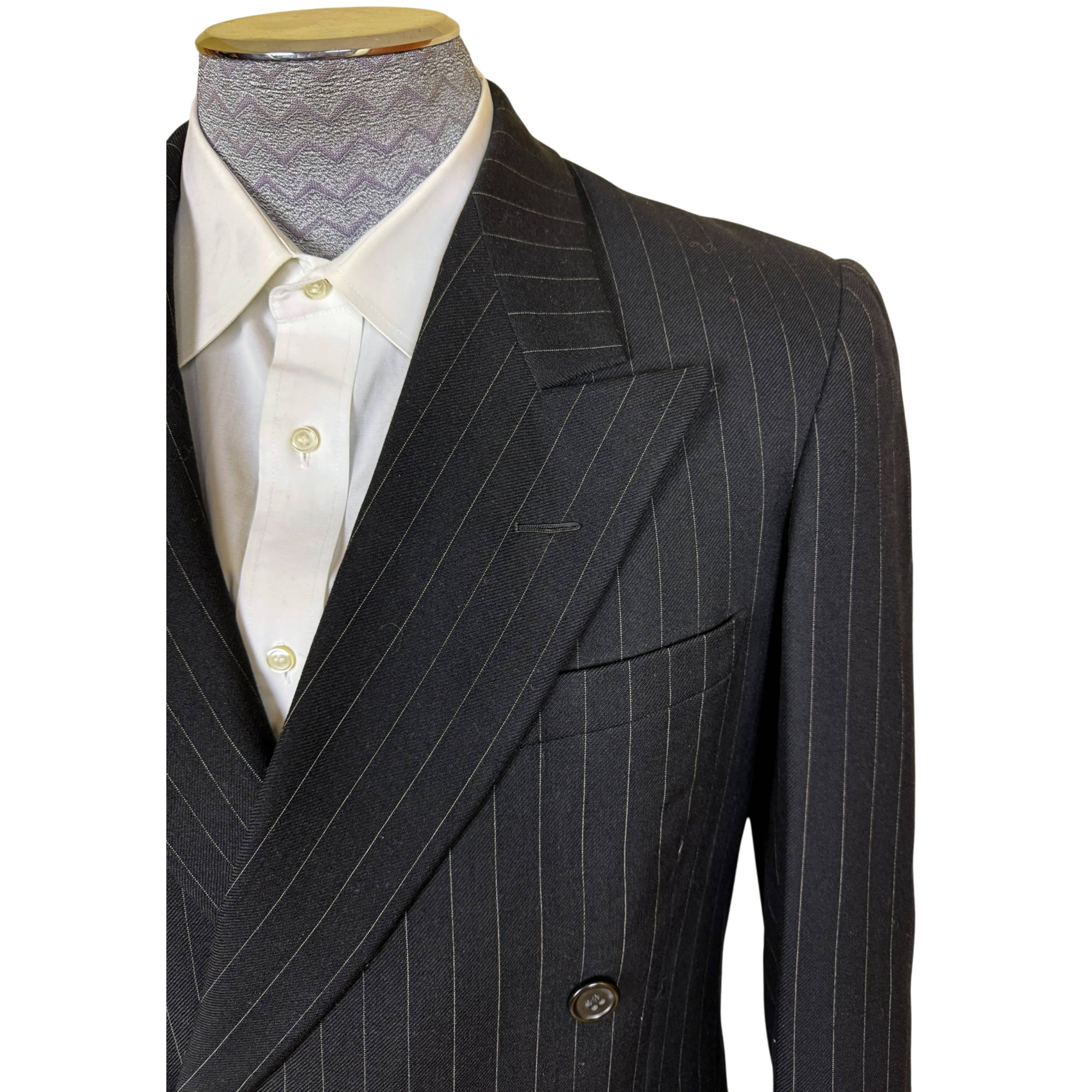 1951 men's suit jacket with broad peak lapels and padded shoulders