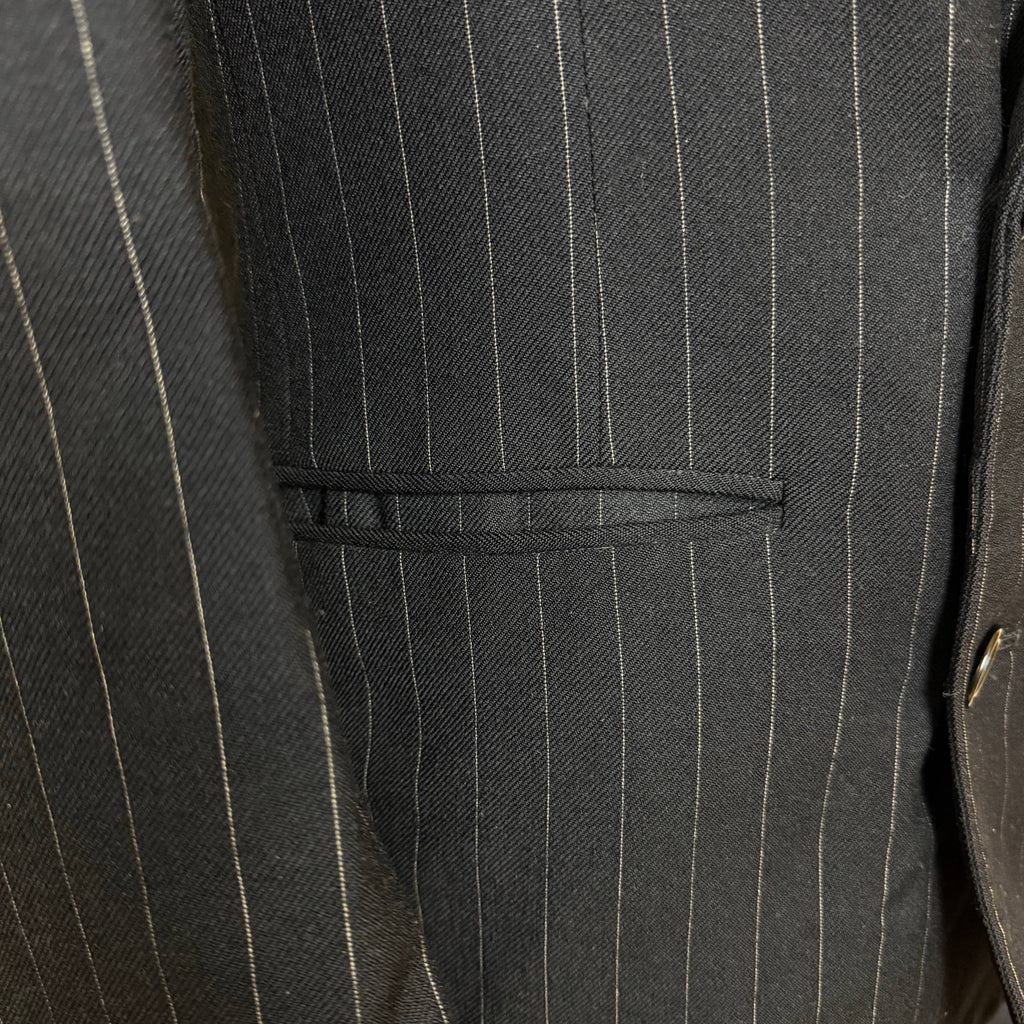 Jetted hip pocket and fine pinstripe fabric on 1951 suit jacket