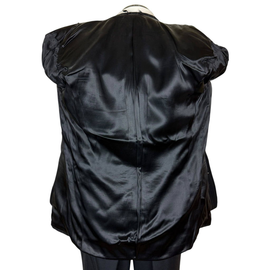 Black lining inside vintage 1951 Progress Brand suit jacket