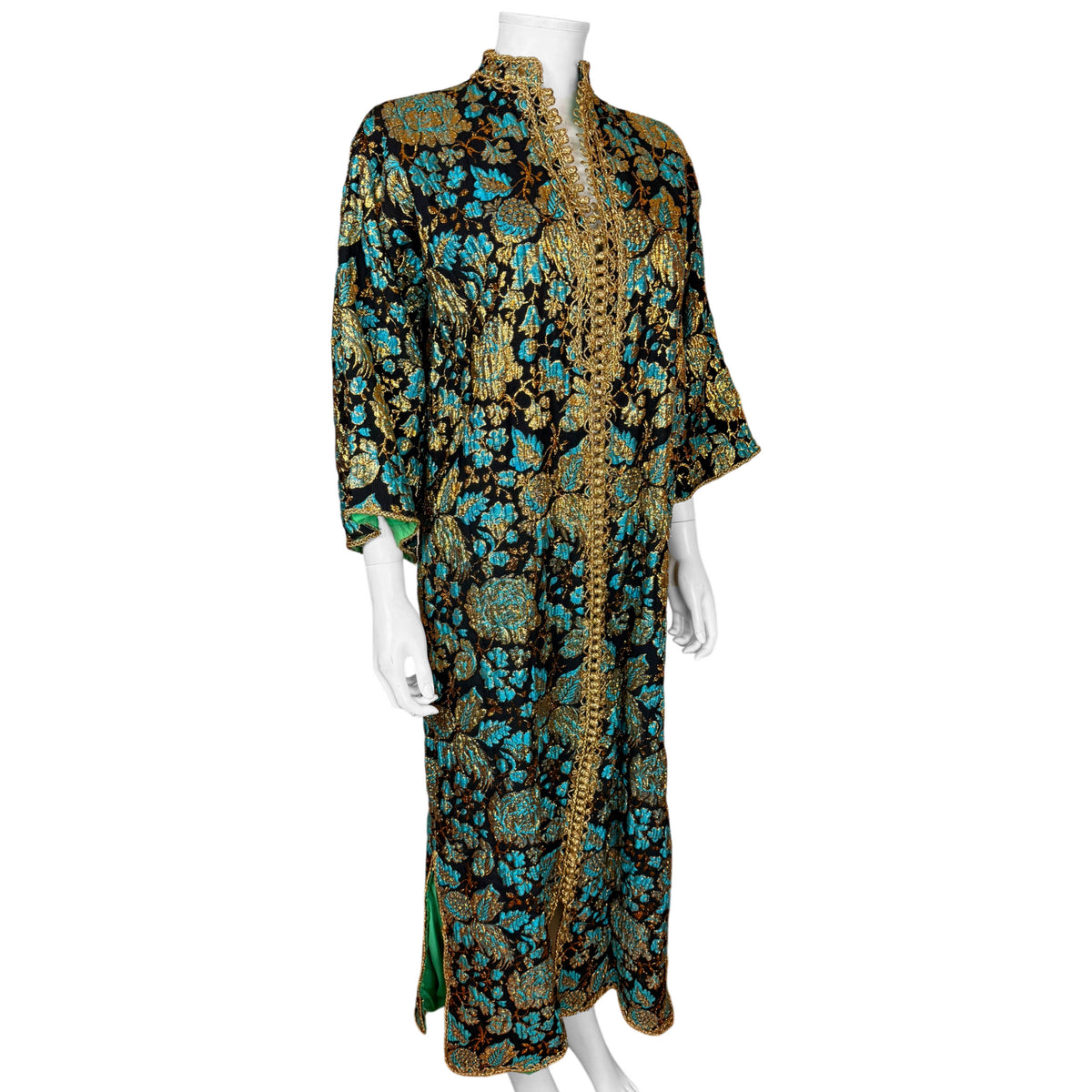 Three-quarter front view of vintage Moroccan silk brocade kaftan showing gold sfifa trim and long silhouette