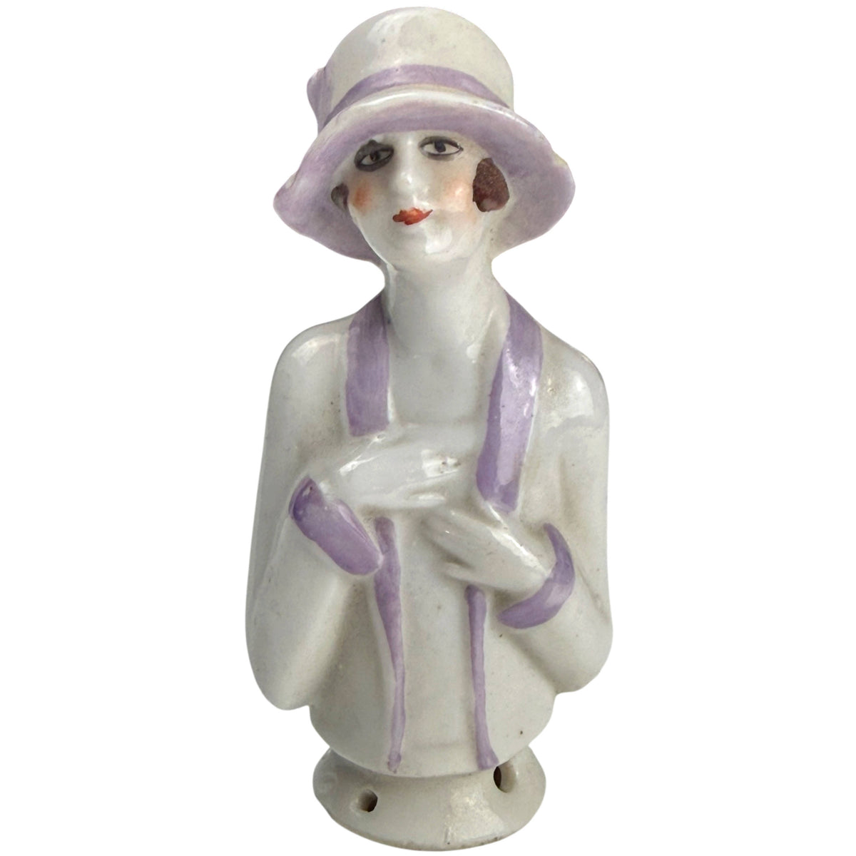Antique 1920s German porcelain half-doll flapper girl wearing a lavender-trimmed cloche hat, front view