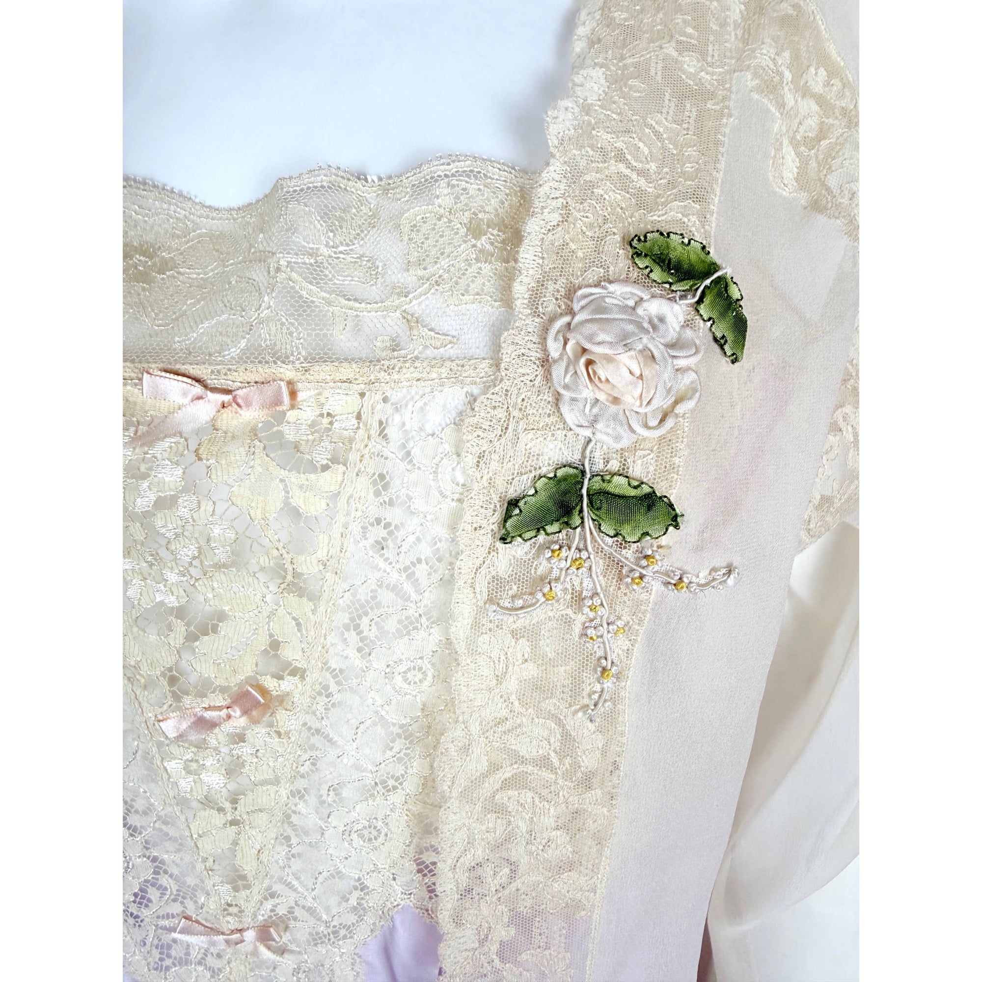 detail of lace on 1920s bedjacket