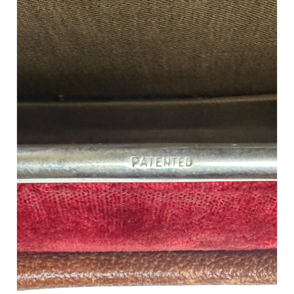 PATENTED marking stamped on silver-coloured metal frame of antique Edwardian velvet handbag