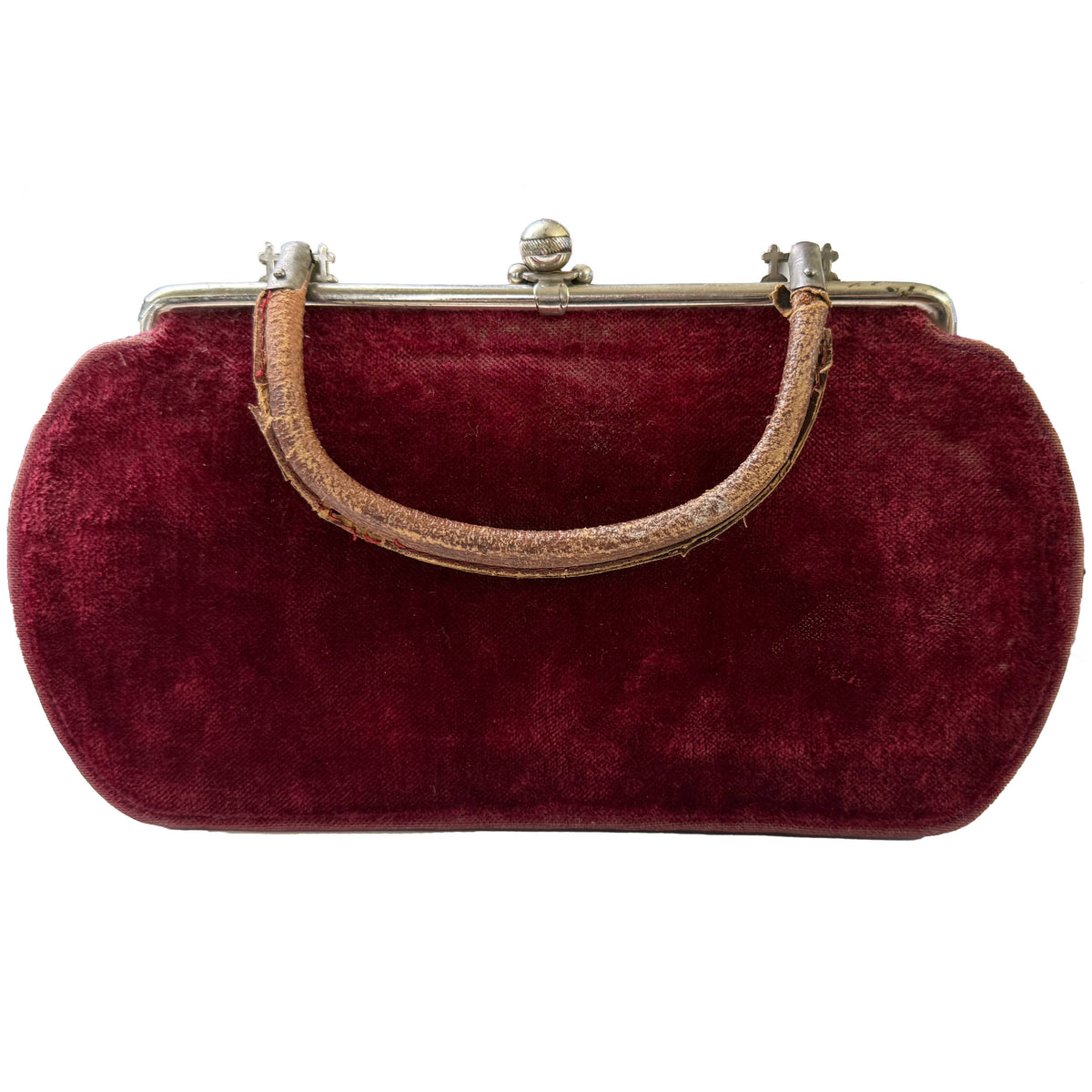 Antique Edwardian burgundy red velvet handbag c.1900–1915, front view showing silver-coloured frame, ball clasp and worn leather handle