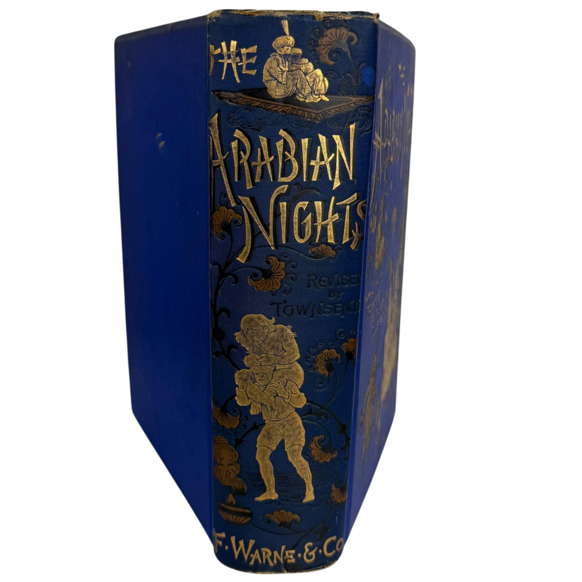 Decorative gilt spine of Arabian Nights Frederick Warne edition