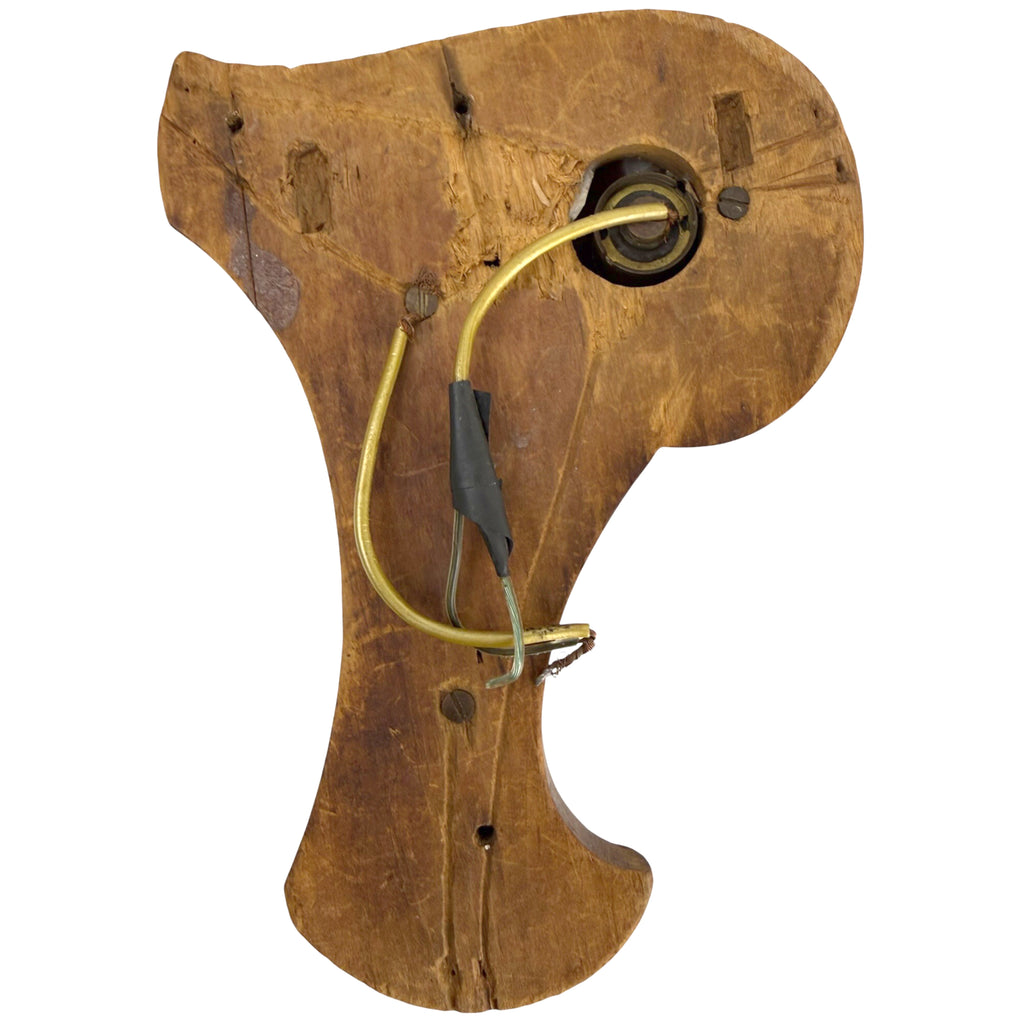 Reverse of antique electric bell push showing early mechanism and wiring