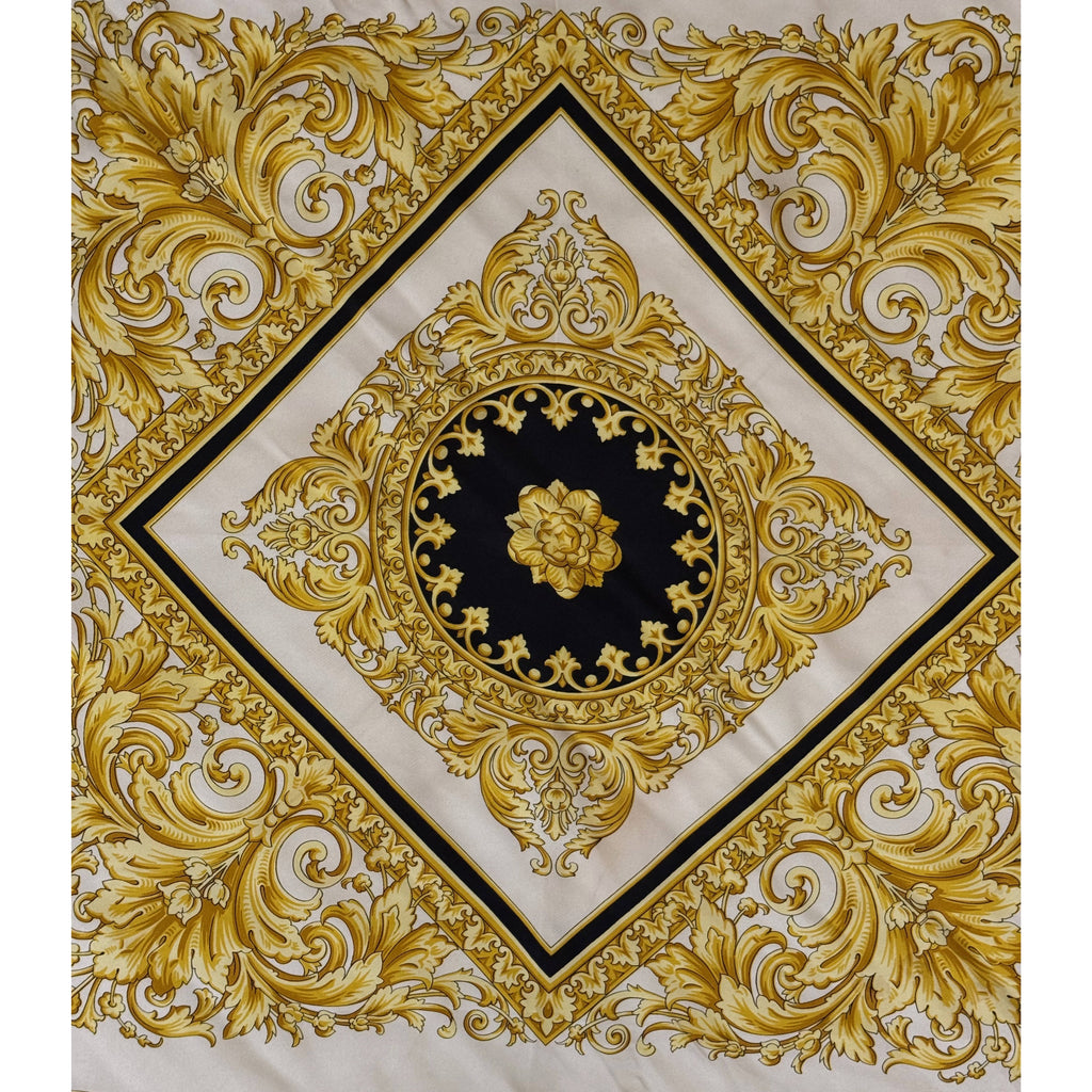 Central diamond medallion and gold acanthus scrollwork on vintage Atelier Versace silk scarf