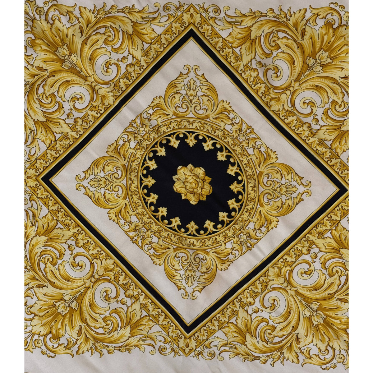 Central diamond medallion and gold acanthus scrollwork on vintage Atelier Versace silk scarf
