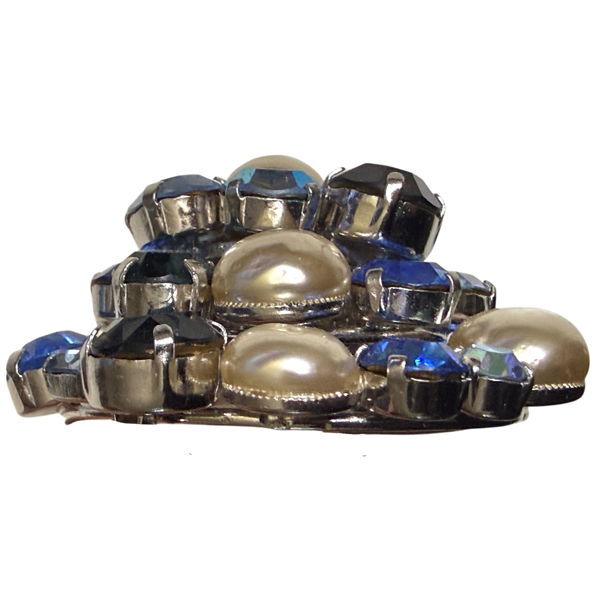 Side profile showing domed construction of Austrian rhinestone brooch