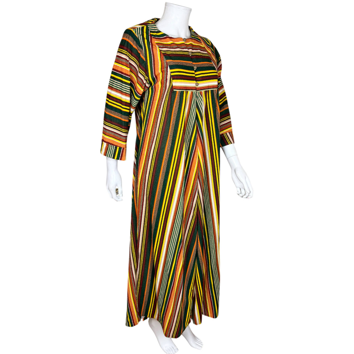 Three-quarter front view of Bard's vintage striped maxi robe showing geometric pattern and buttoned bodice