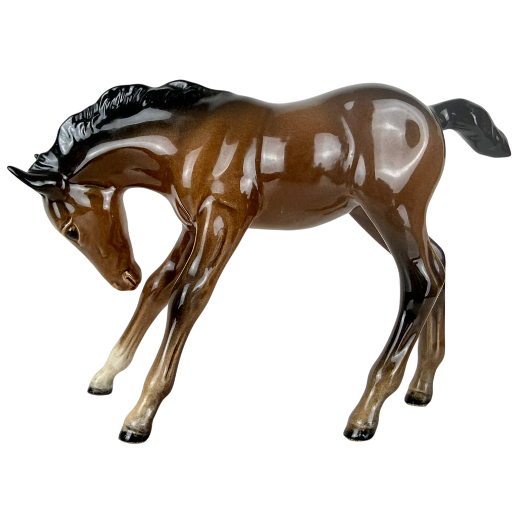 side view of Beswick Large Foal Head Down Horse Figurine Model 947