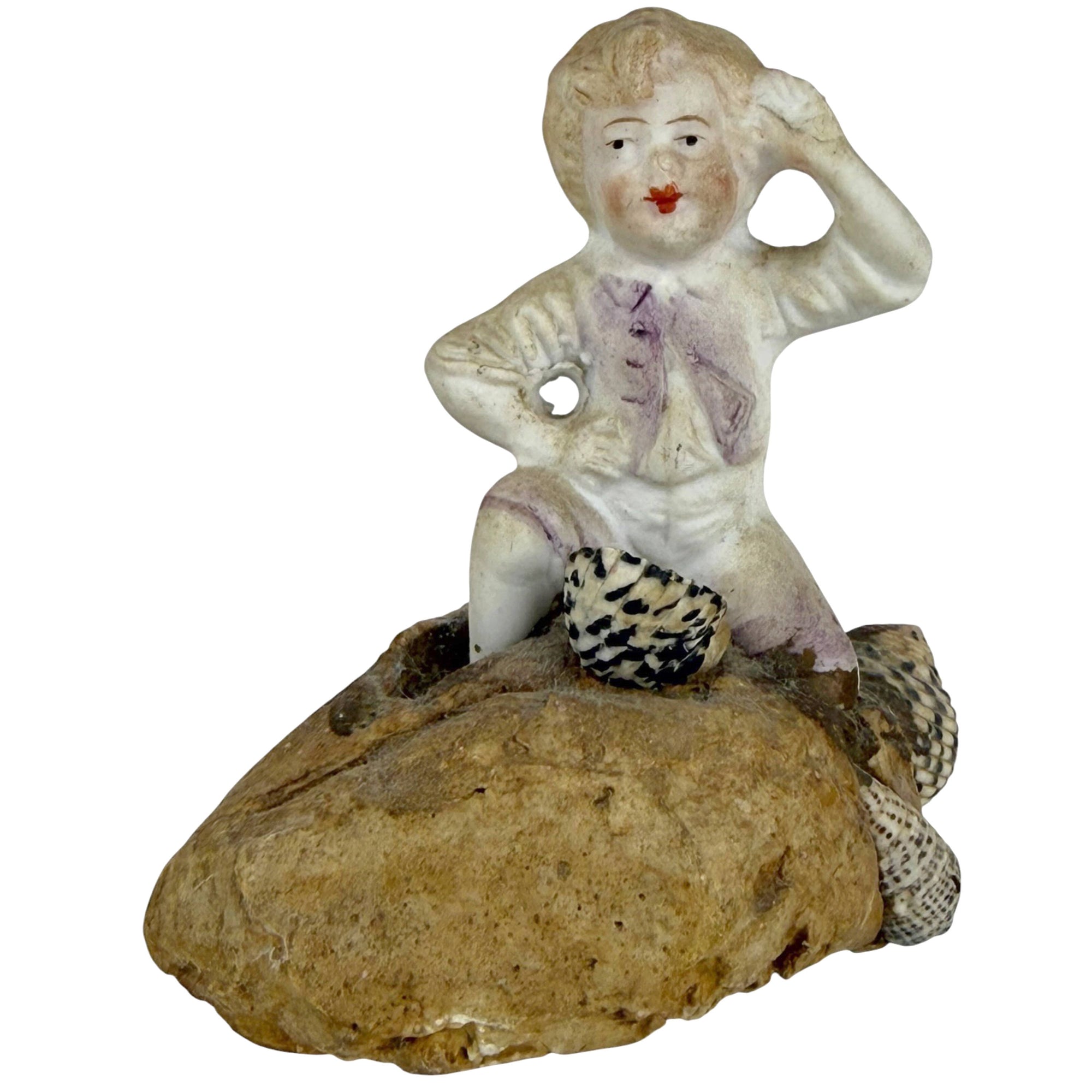 Antique Bisque Child Figurine on Shell-Form Base with Natural Seashells c.1890–1910