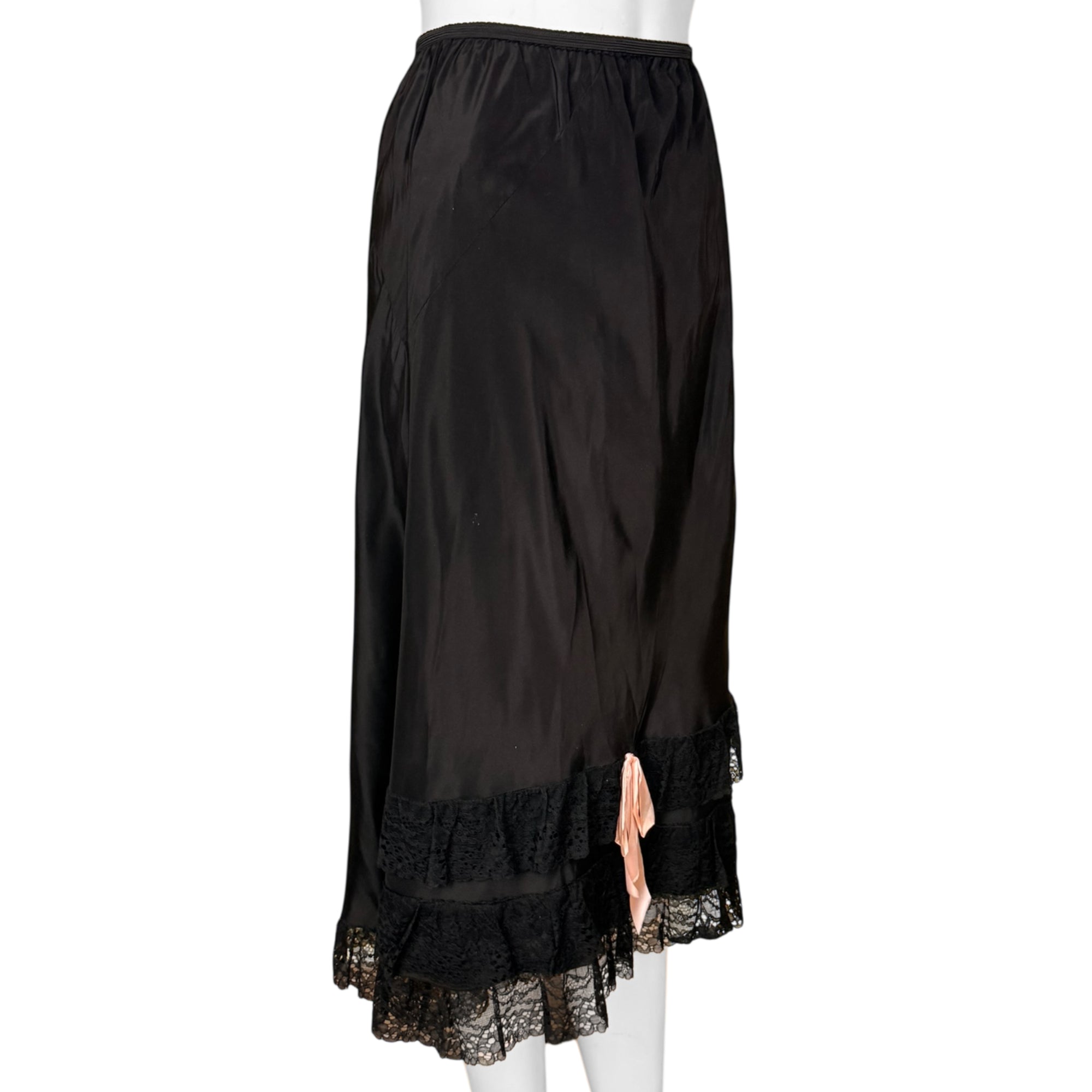 Side view of vintage black lace trimmed half slip