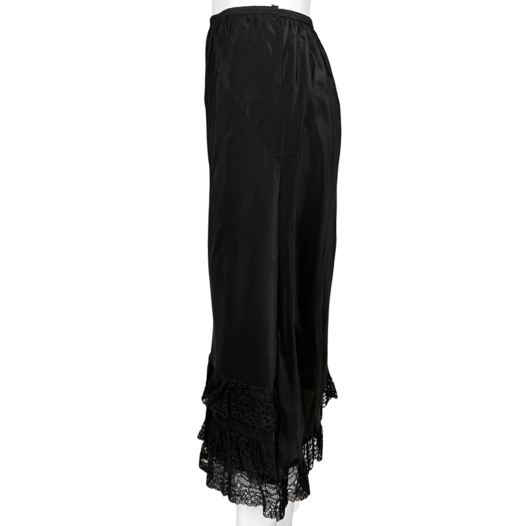 Left side view of vintage black lace trimmed half slip