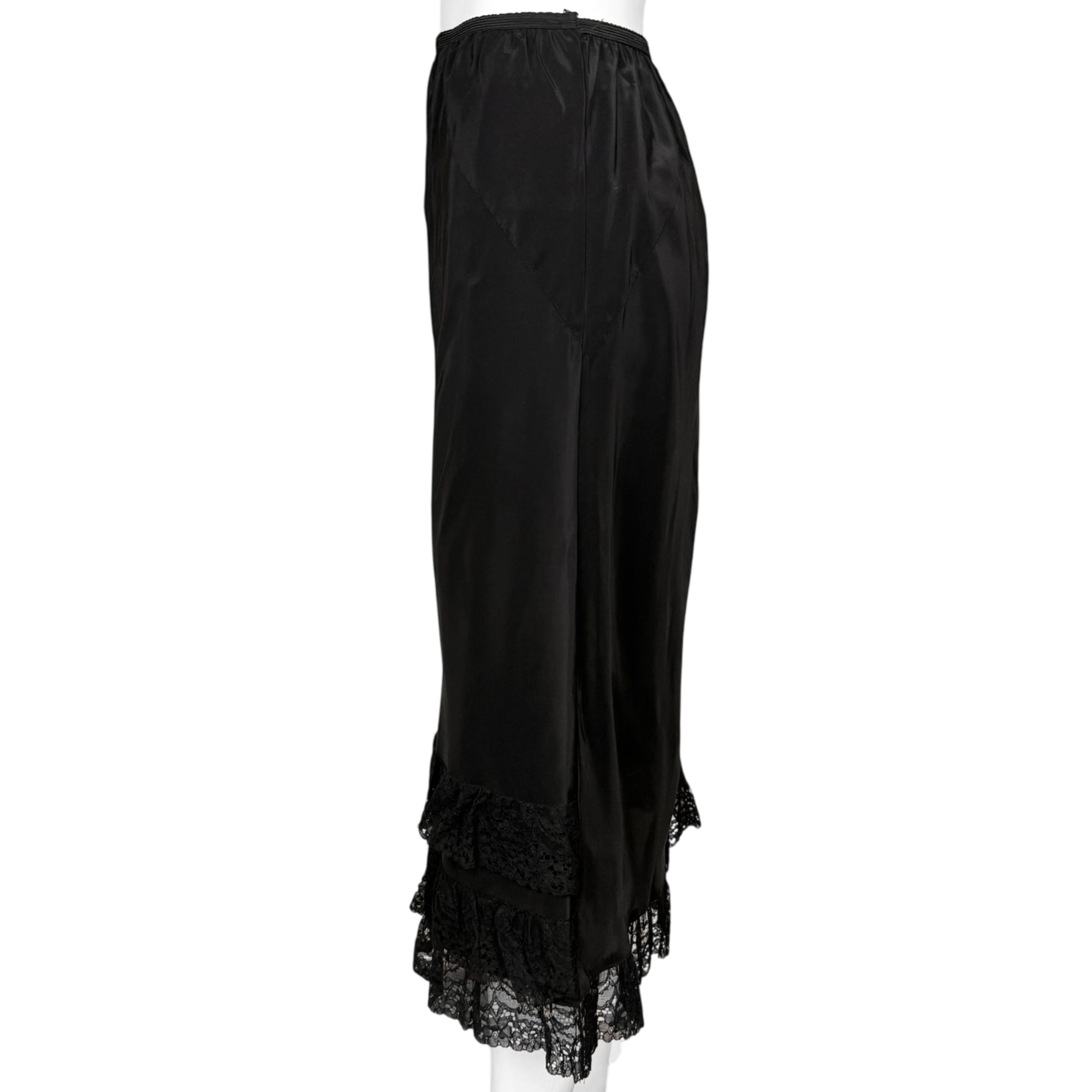 Left side view of vintage black lace trimmed half slip