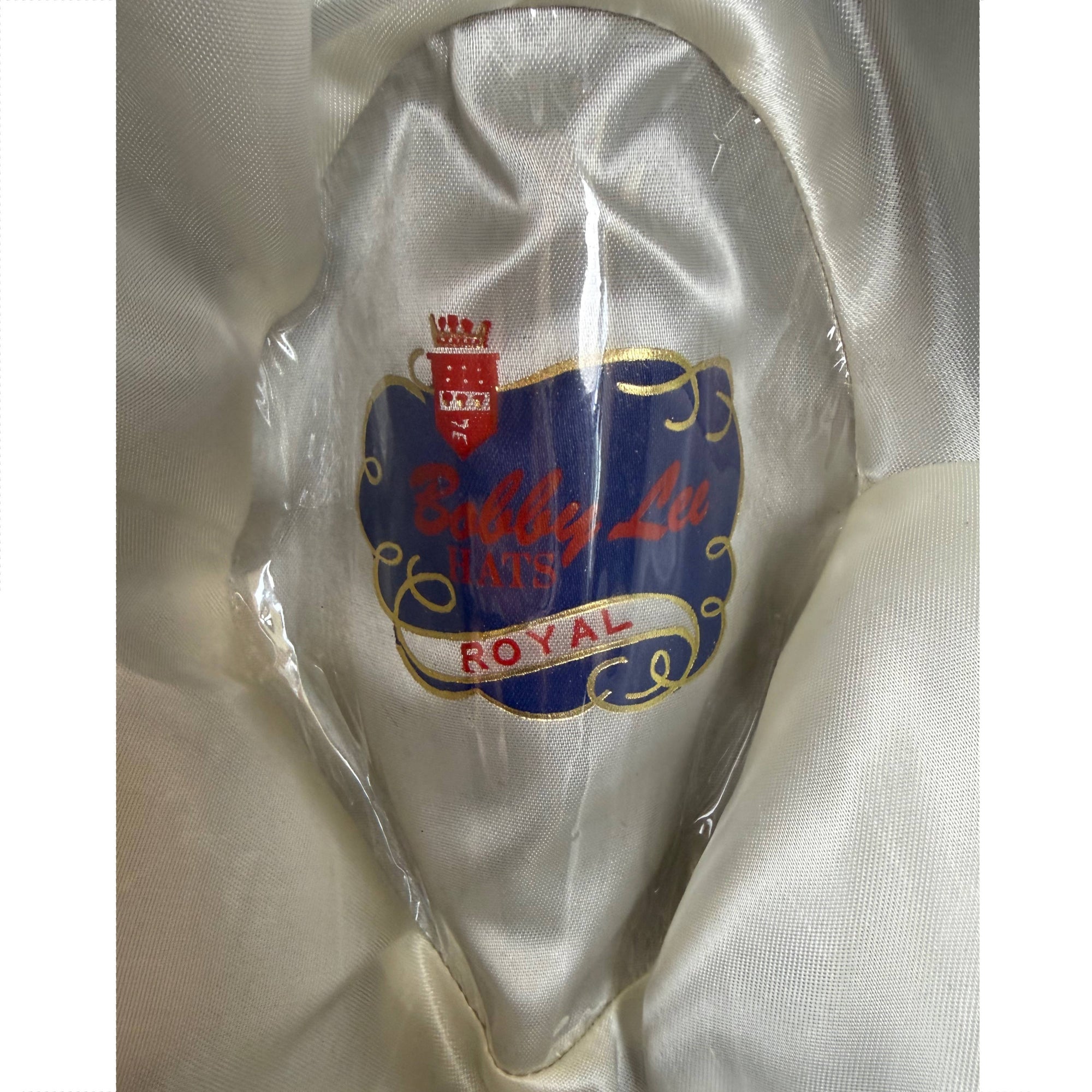 Close-up of Bobby Lee Hats Royal logo inside vintage Magill Montreal fedora