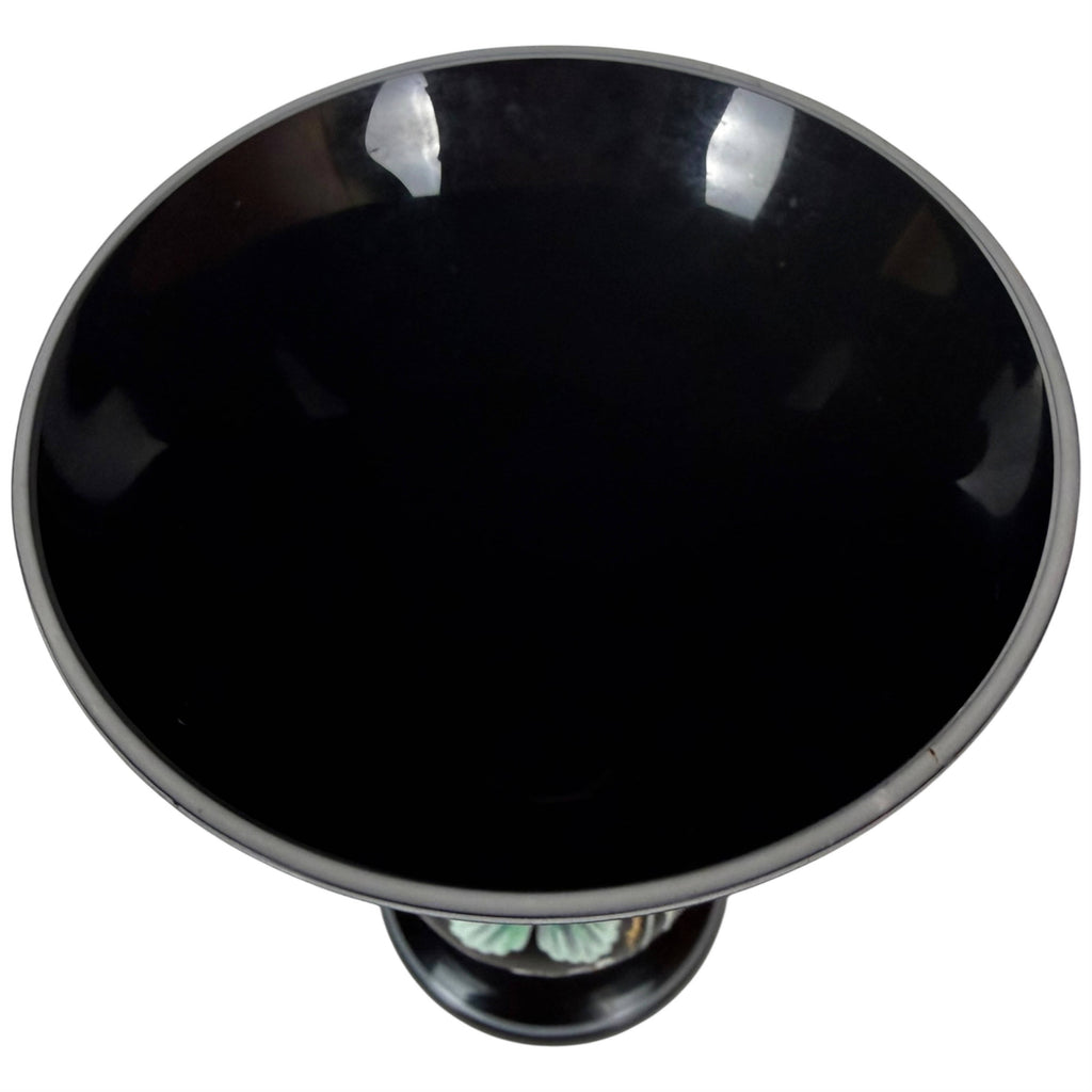 Top view of antique black amethyst cased glass vase with white interior