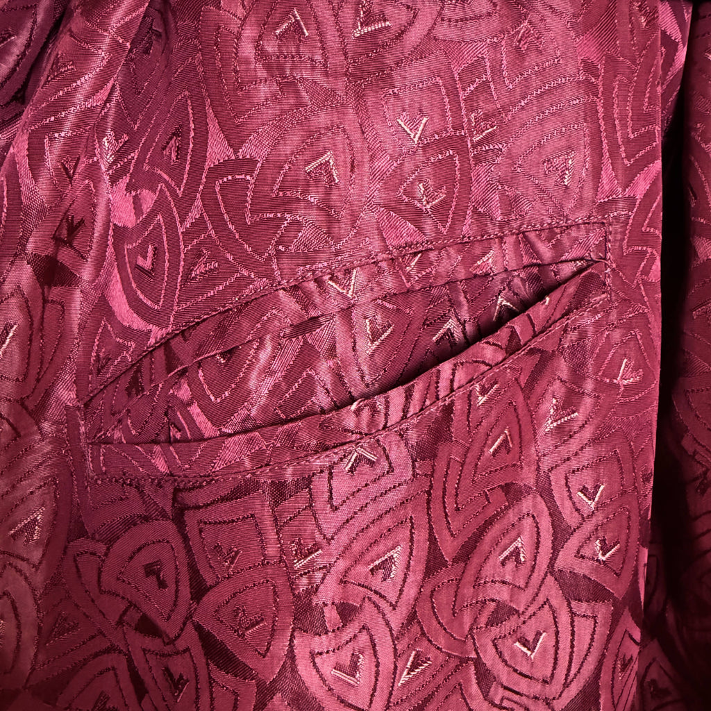 pocket detail on 40s smoking jacket