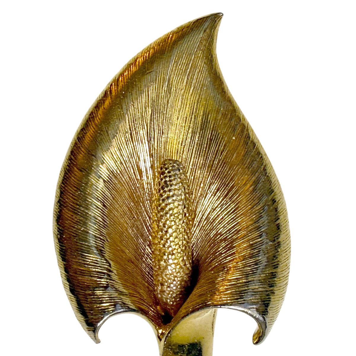 Detailed front view of vintage Marcel Boucher gold-plated calla lily brooch showing engraved petals and textured spadix