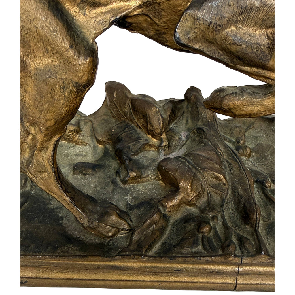 Naturalistic leaf and branch base on antique pointer dog sculpture