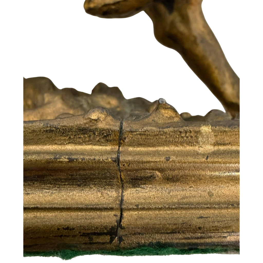 Detail of crack and aged finish on spelter sculpture base
