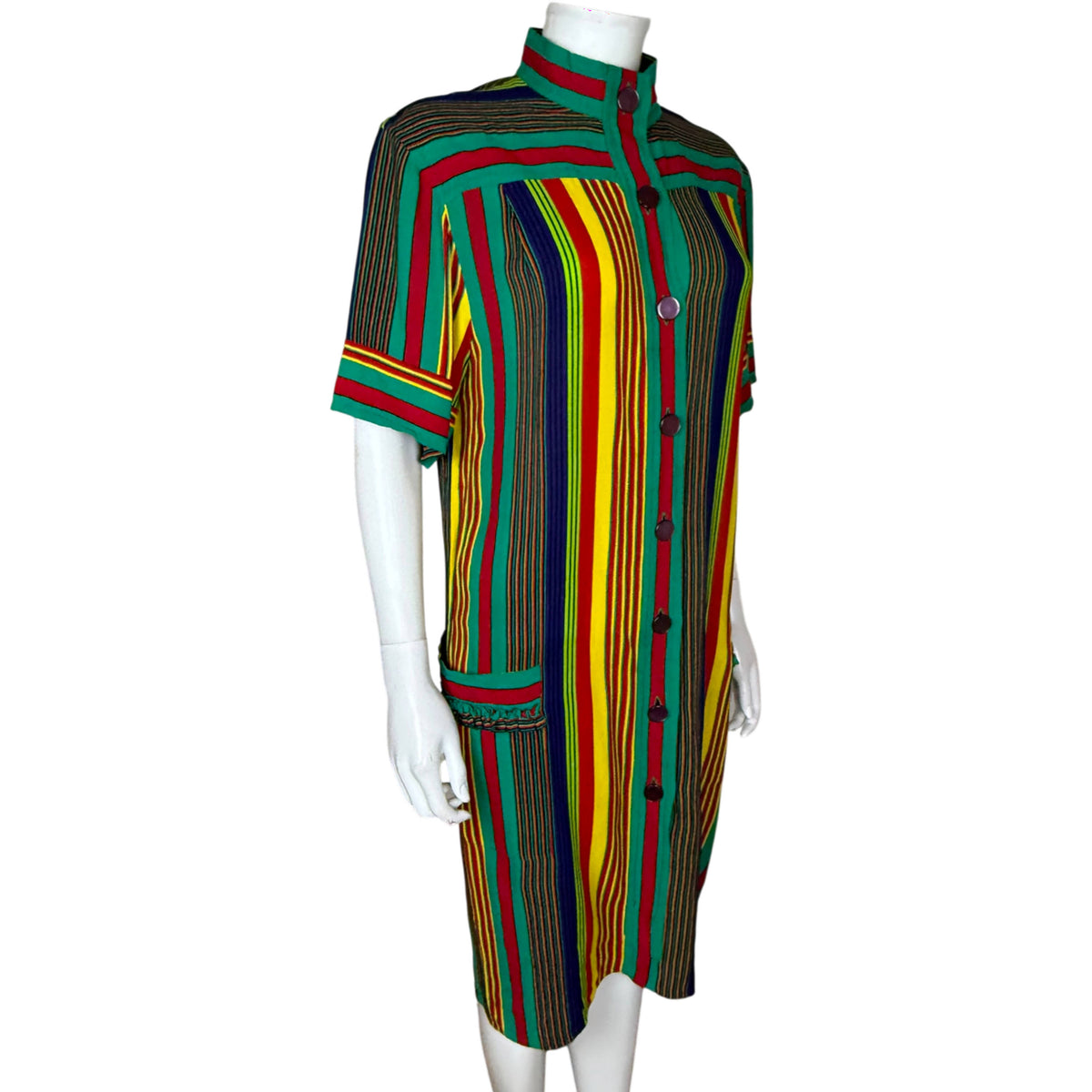 Three-quarter front view of vintage Céline Paris striped shirt dress with stand collar and decorative hip pockets