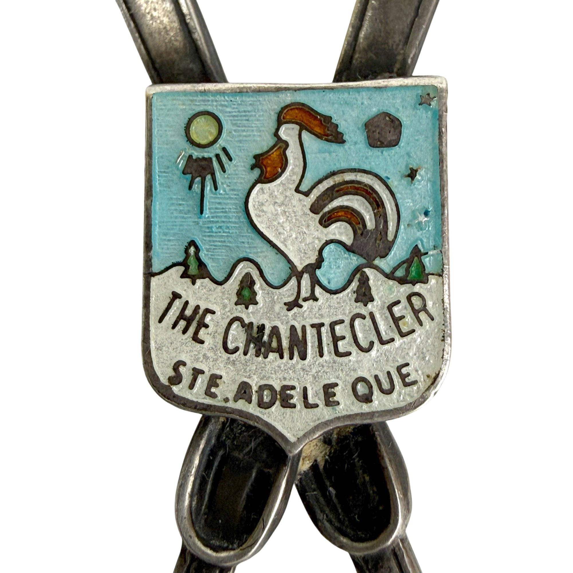 Enamelled Chantecler rooster shield on crossed skis brooch