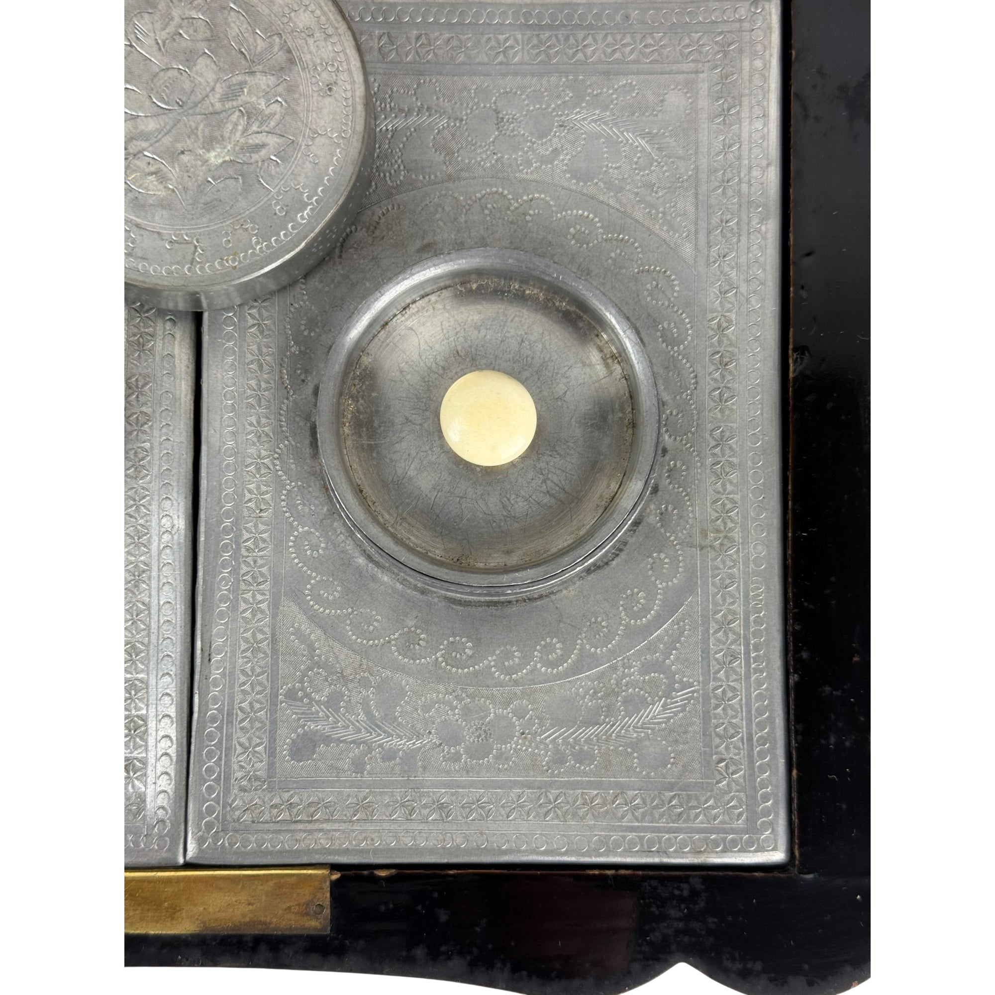 second lid on metal tea canister