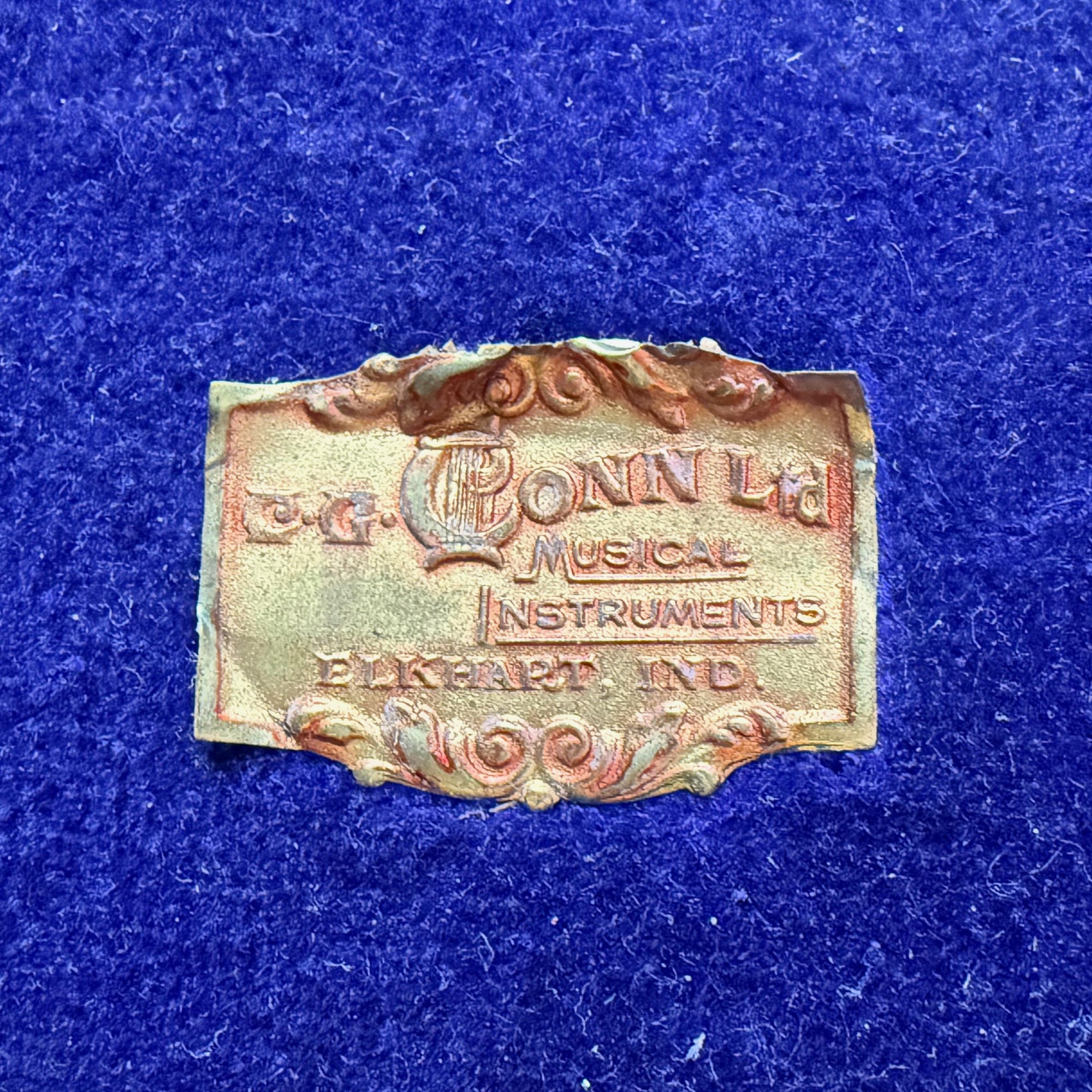 Conn musical instruments label