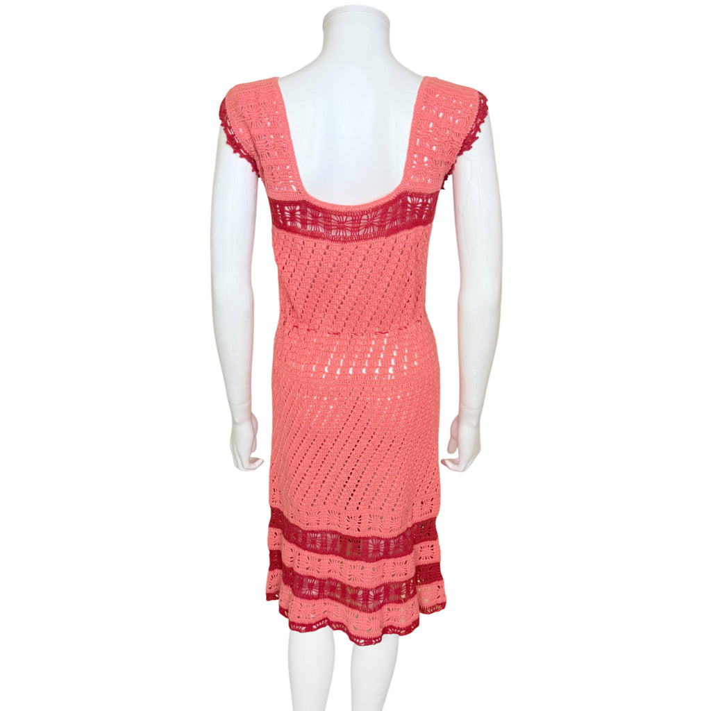 Rear view of handmade coral boho crochet dress