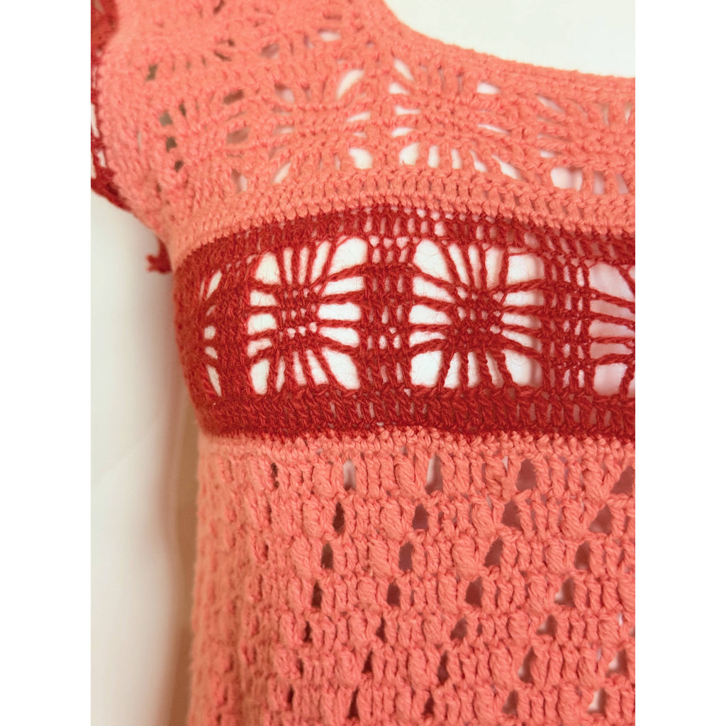 Detail of geometric crochet panel on vintage dress