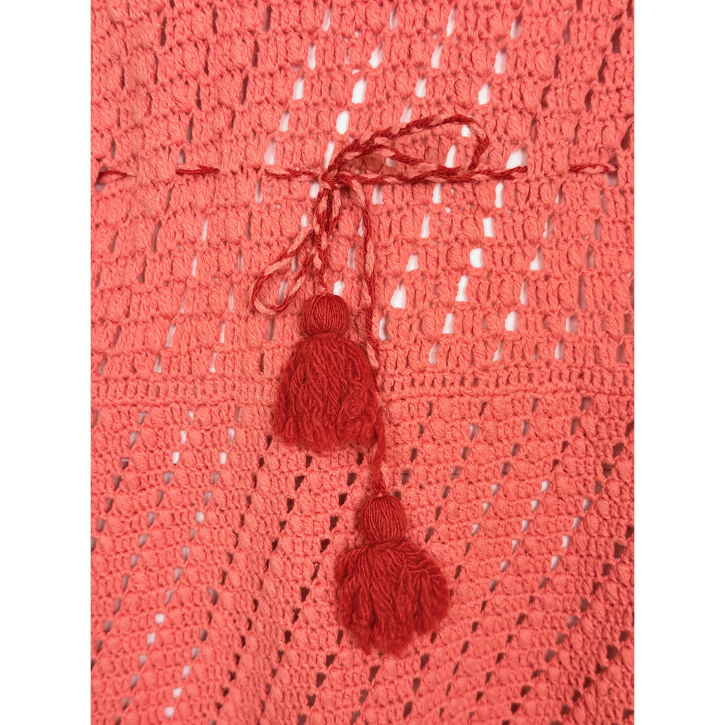Tassel drawstring waist detail on 1970s crochet dress