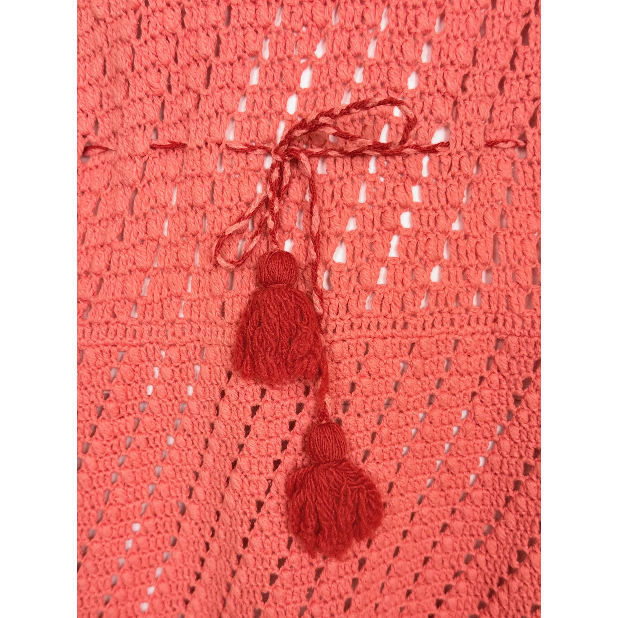 Tassel drawstring waist detail on 1970s crochet dress