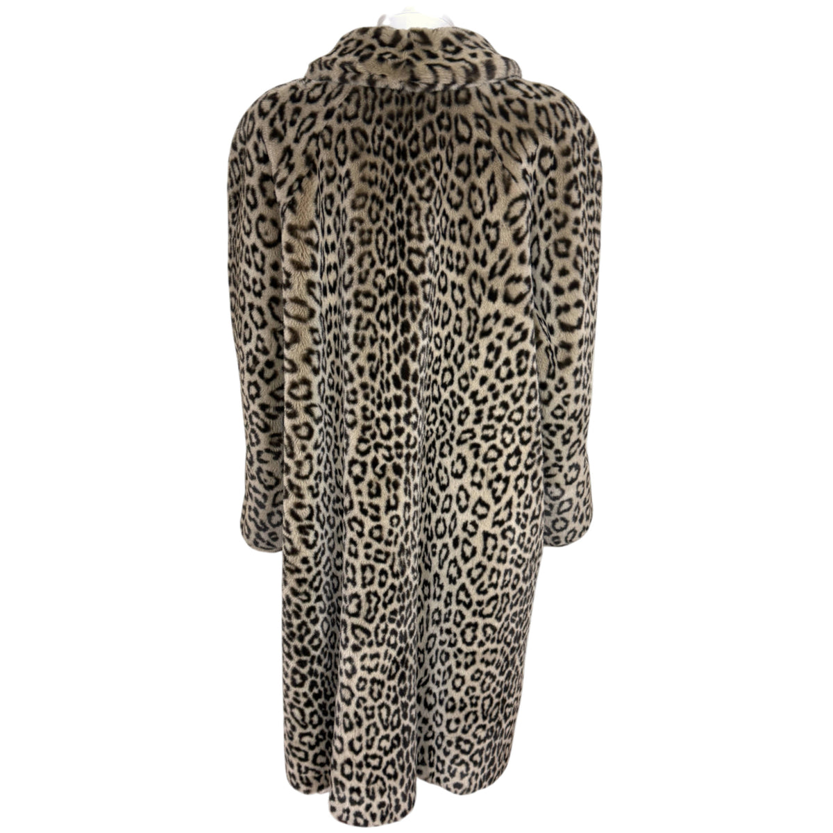 Back of vintage French leopard print faux fur coat showing full A-line cut, raglan sleeves and wide hemline