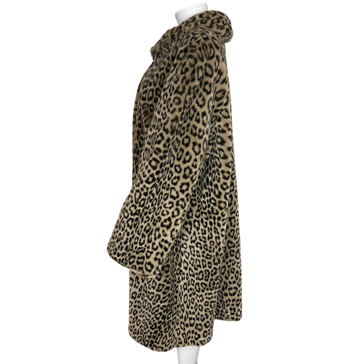 Side view of vintage 1980s French acrylic faux fur leopard coat showing flared silhouette and generous sleeve proportions