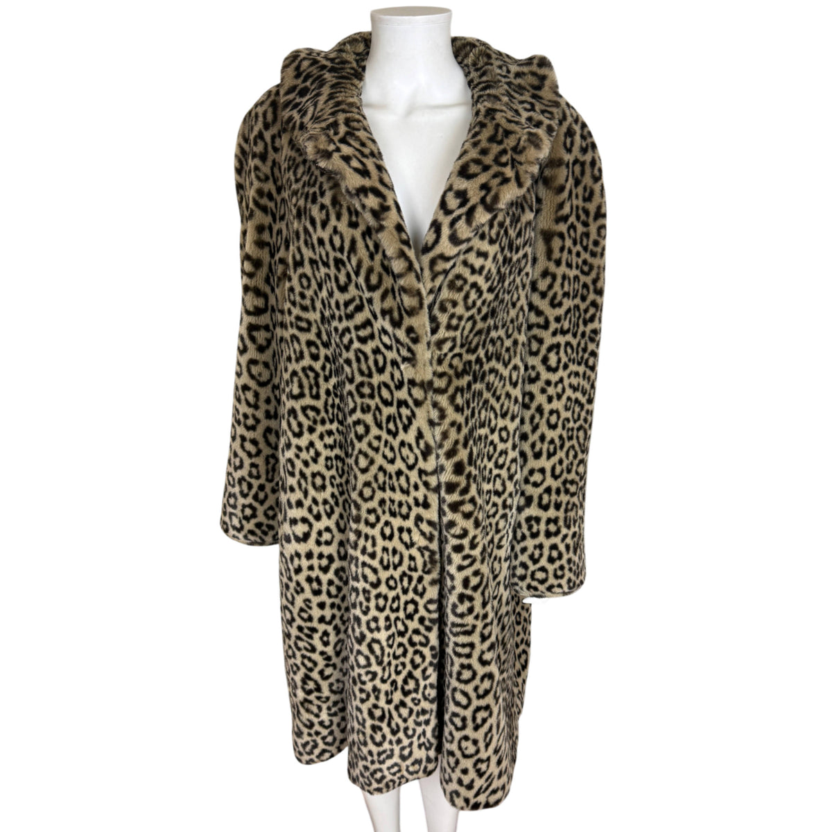 A vintage 1980s leopard print French acrylic pile faux fur coat displayed with an open neck