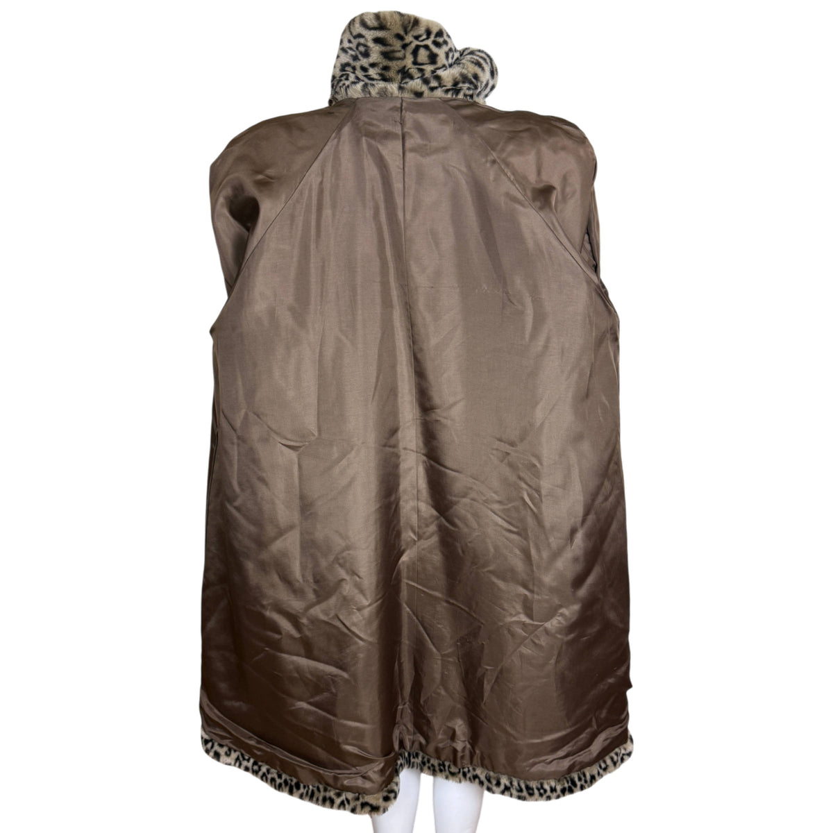 Taupe-brown satin-like lining inside vintage French leopard print faux fur coat