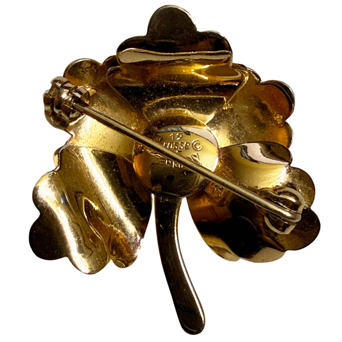 Reverse of 1965 Grossé floral brooch showing gold-plated construction, pin clasp and signed maker's mark