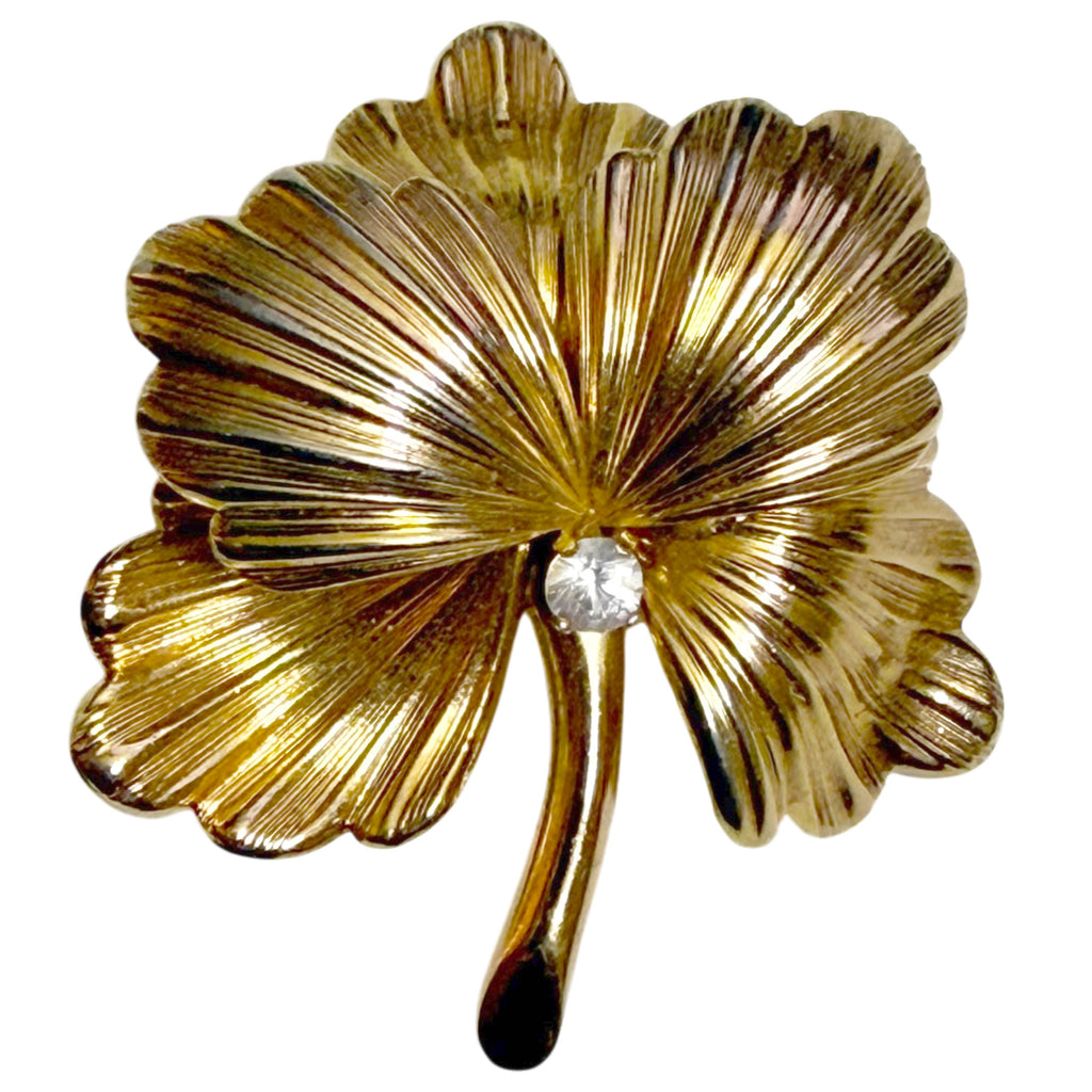 Vintage 1965 Grossé gold-plated five-leaf floral brooch with textured fan-shaped leaves and central clear rhinestone