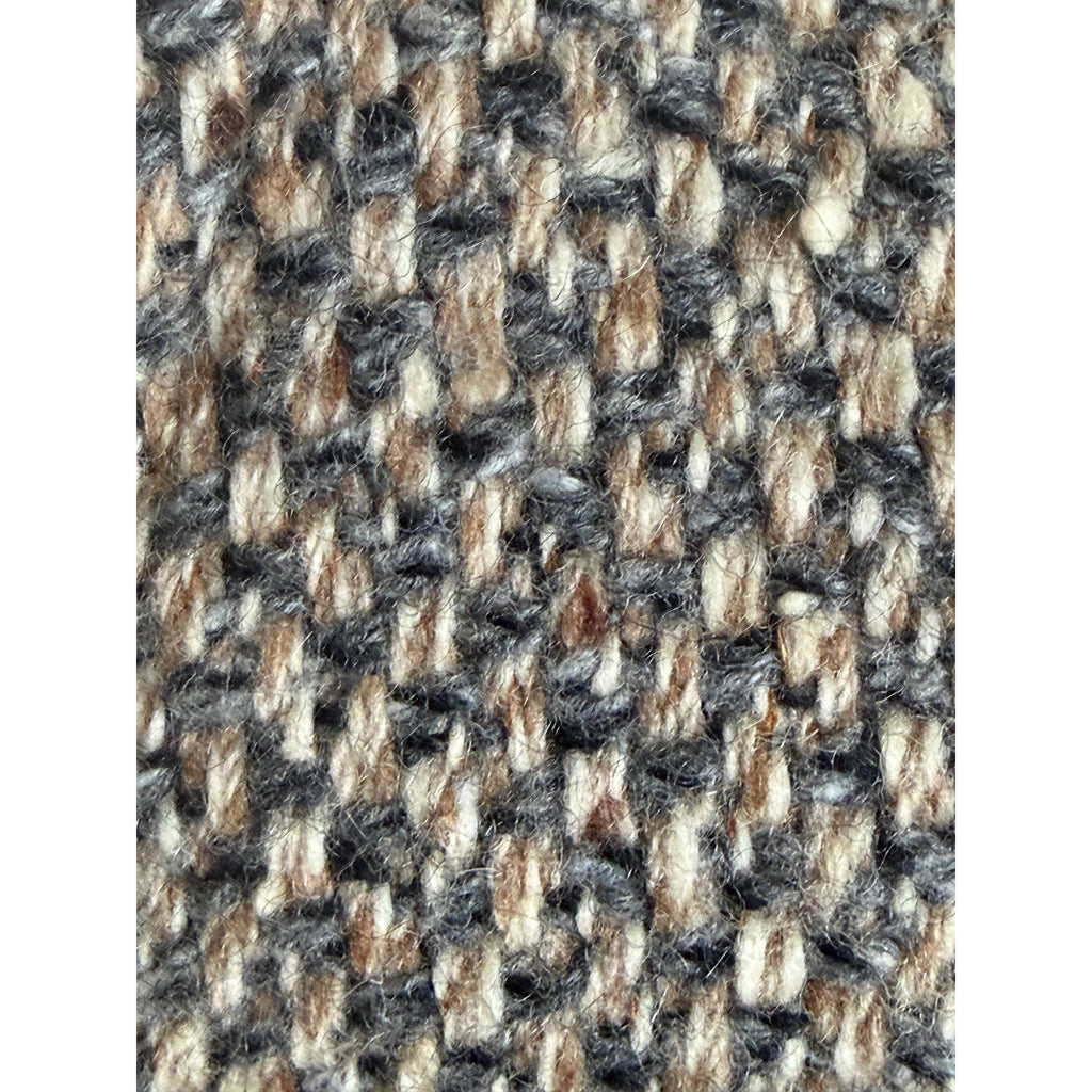 D'Allaird's  vintage coat textured wool tweed fabric close-up in grey cream and camel