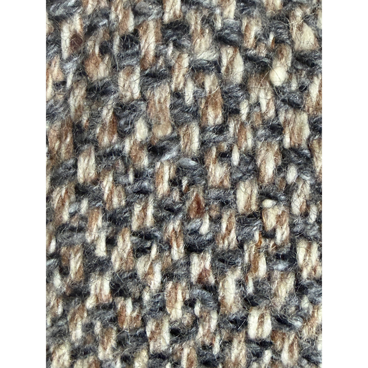D'Allaird's  vintage coat textured wool tweed fabric close-up in grey cream and camel