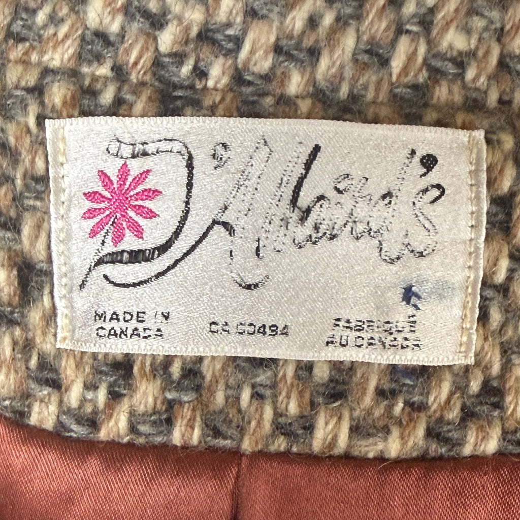 D'Allaird's vintage coat textured wool tweed fabric close-up in grey cream and camel