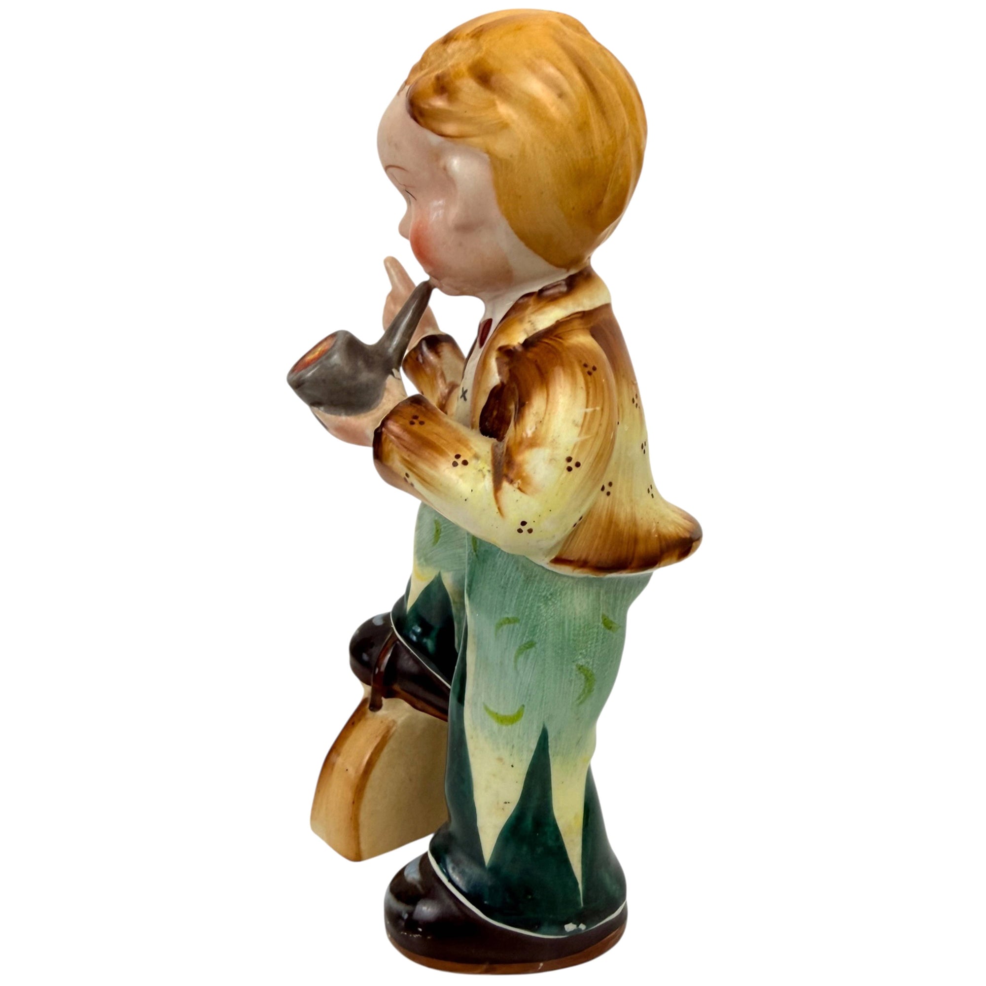 Back view of Vintage 1930s Japanese export figurine boy smoking pipe